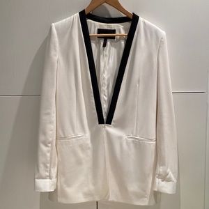 White with black trim BCBGMaxAzria jacket. Hook and eye closure.